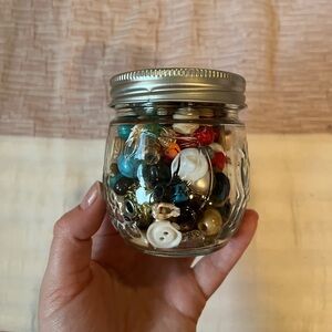Jar of beads + buttons.